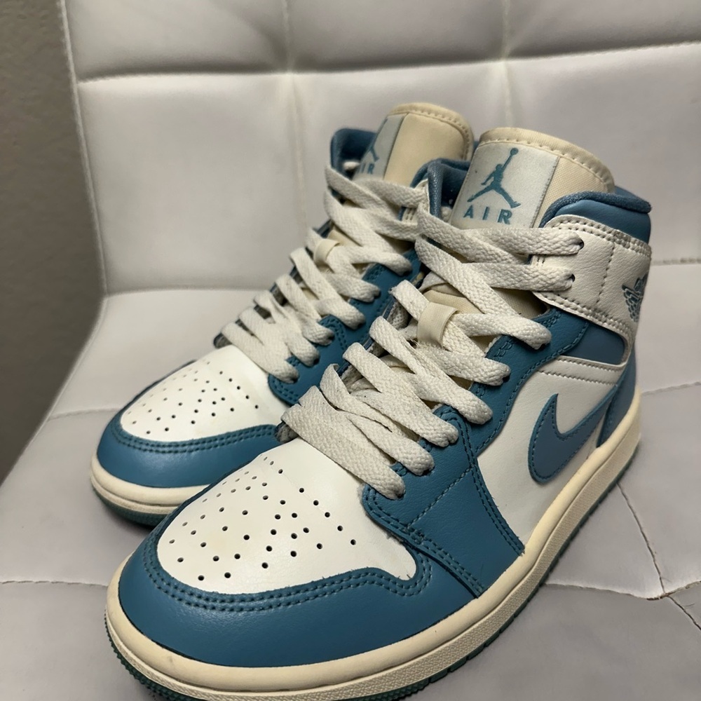 Light blue Nike air jordan 1s